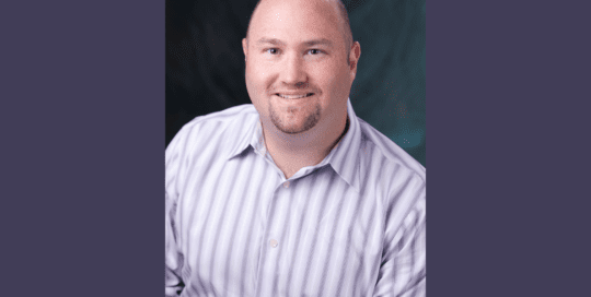 Headshot photo of a man with a smile_BradleyLaye