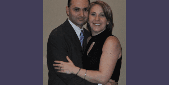 a man and a woman are hugging each other_